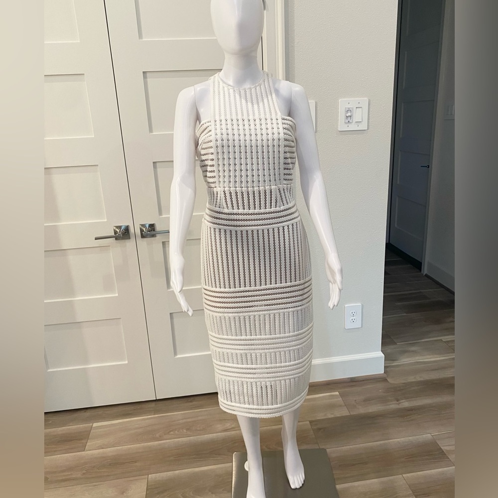 Self-Portrait 
Color: Off-white dress with nude lining, US 8
